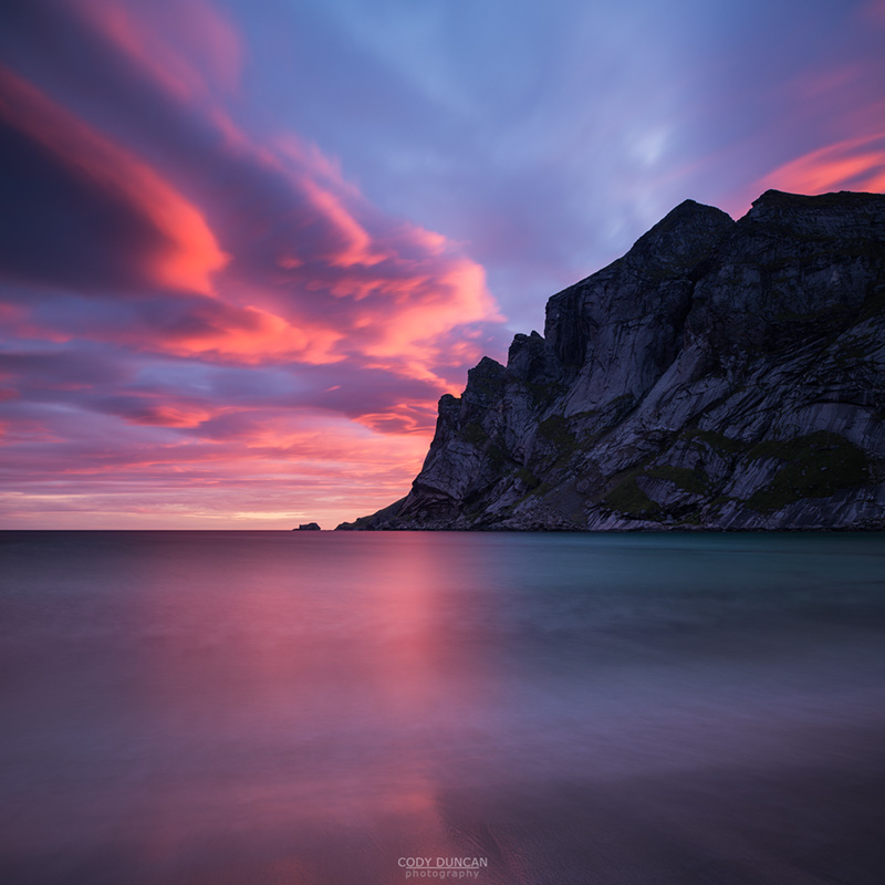 Colorful sunrise over mountains at Bunes Beach, Moskenesoy, Lofoten Islands, Norway