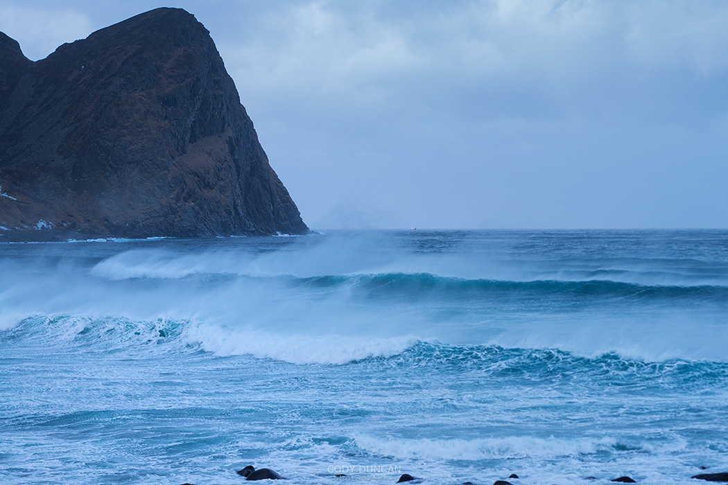 Offshore wind blows waves at Unstad beach, Vestvågøy, Lofoten Islands, Norway