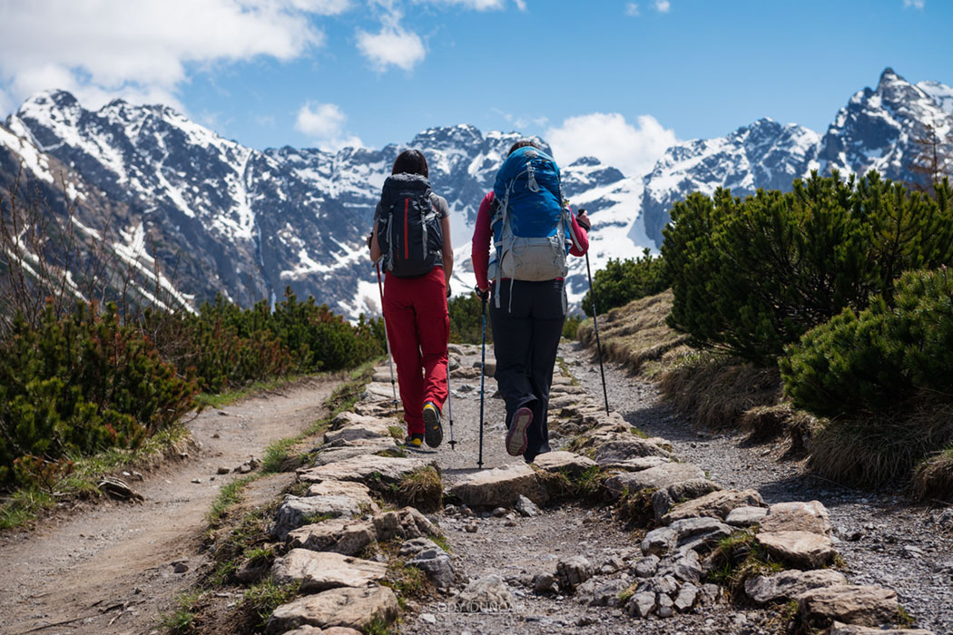 Two female hikers hiking in Tatra mountains, Poland
